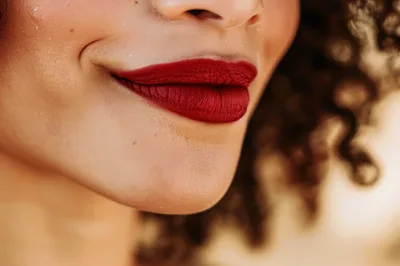 Close Up Of A Woman With Red Lipstick