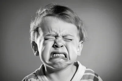 Crying Toddler Boy With Distressed Facial Expression