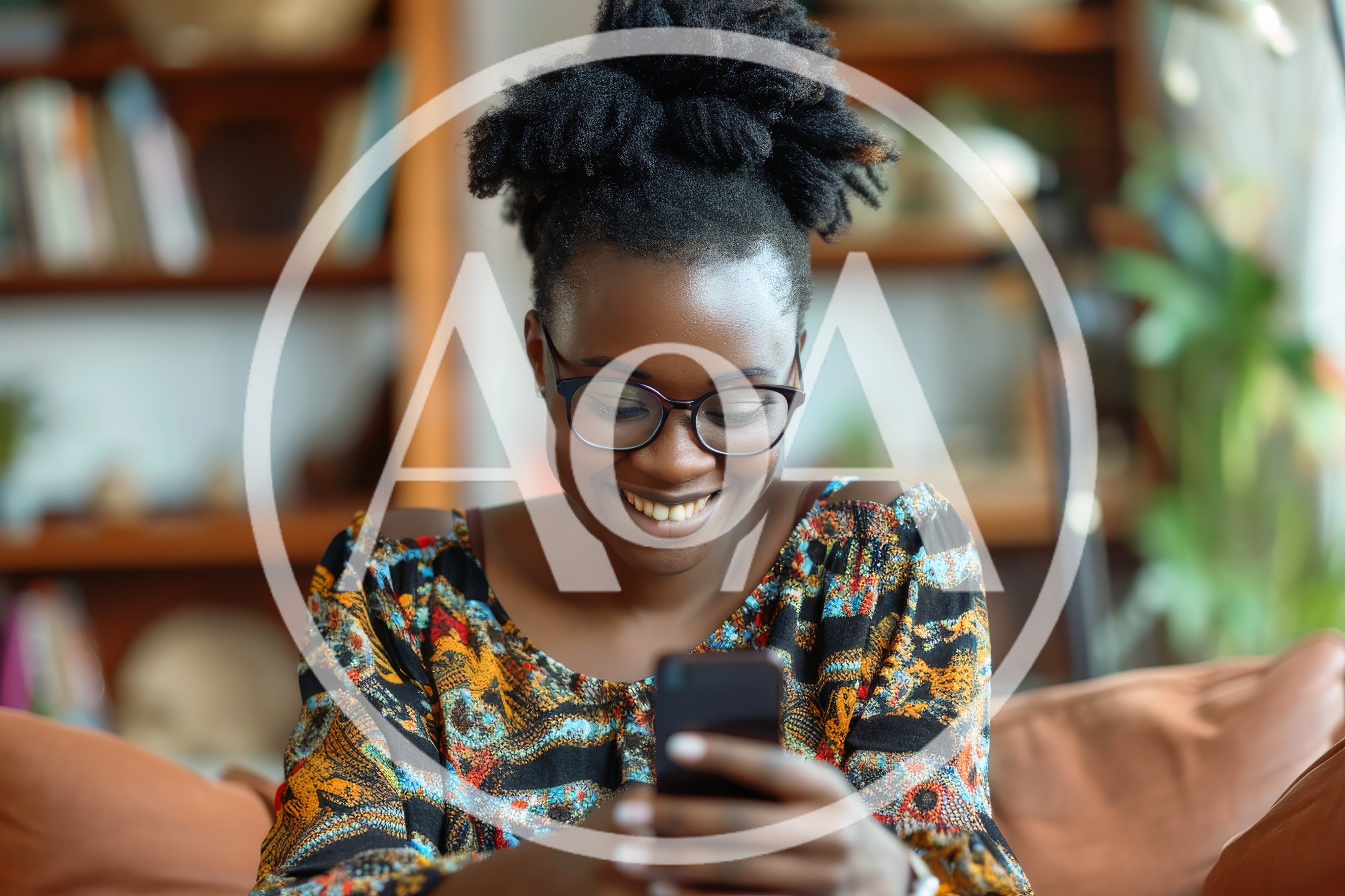 Young African Woman Smiling While Using Her Smartphone