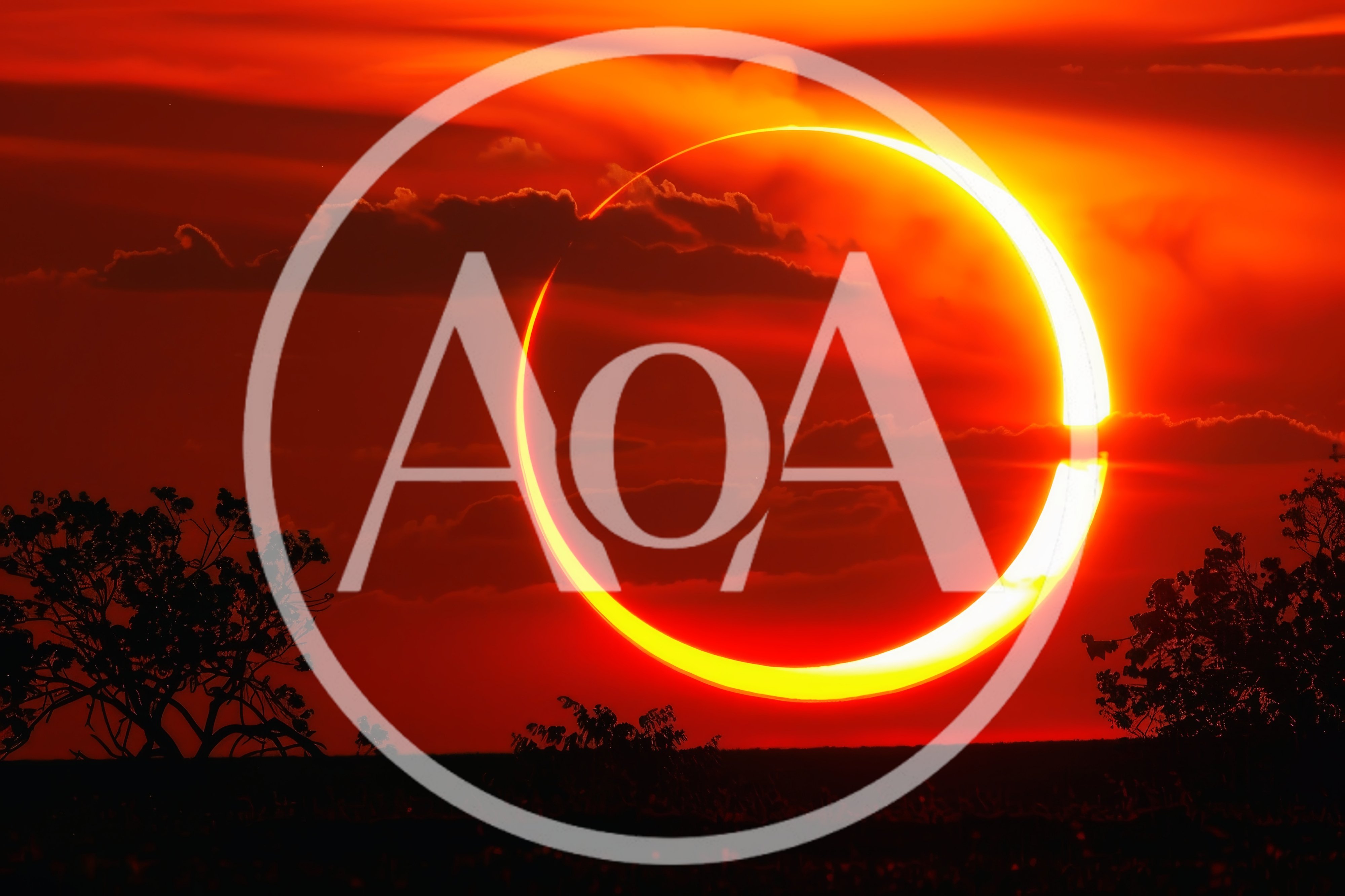Annular Solar Eclipse Over A Silhouetted Landscape