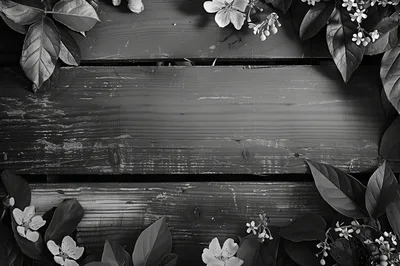 Black and White Floral Frame on Wooden Background