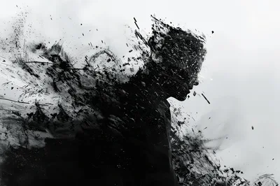 Abstract Silhouette Of A Man Disintegrating Into Particles