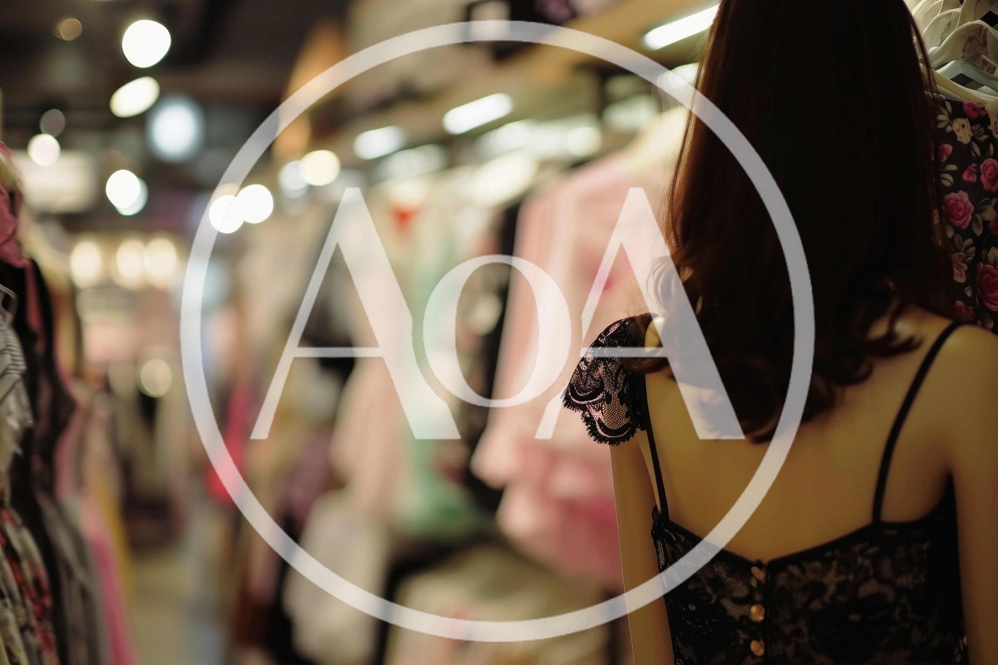 Mannequin Wearing Black Lace Dress In Clothing Store