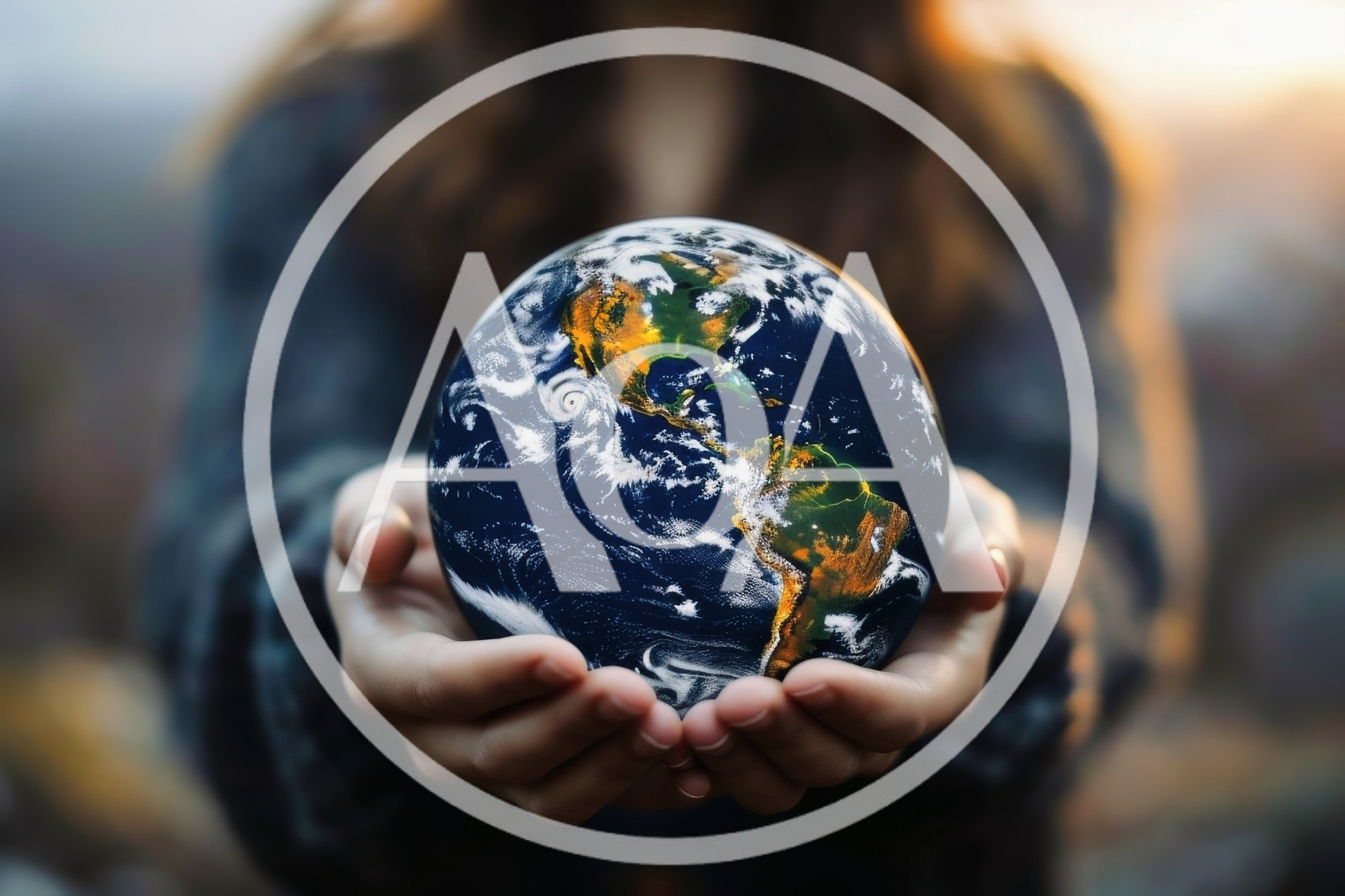 Person Holding A Glowing Earth Globe In Hands