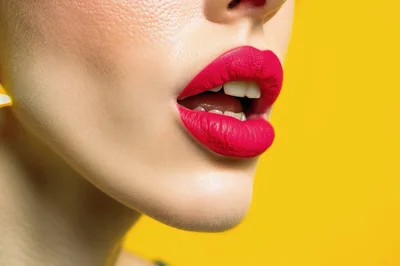 Close Up Of Woman With Bright Pink Lipstick