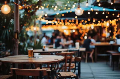Outdoor Restaurant Patio With Beer At Sunset
