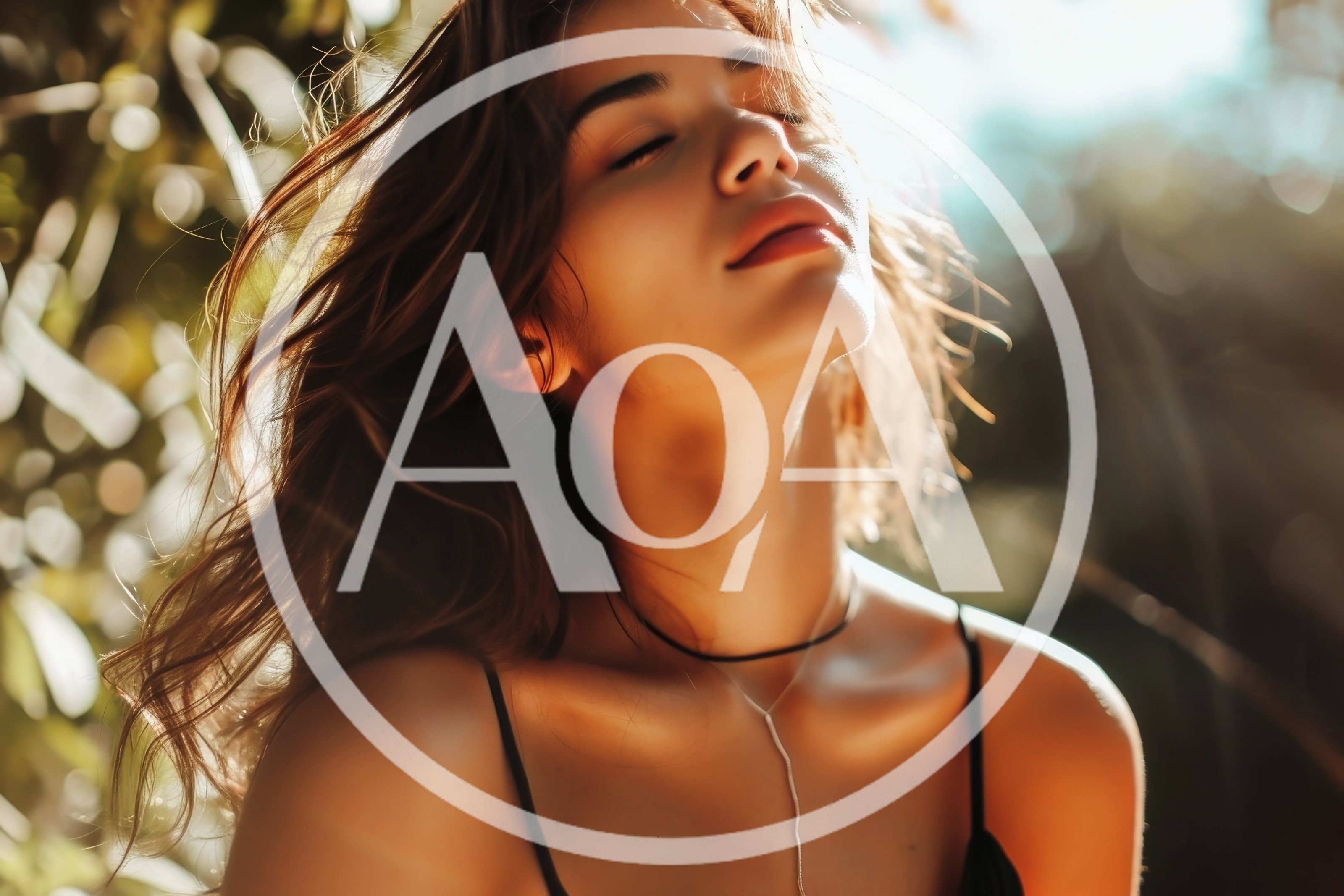 Young Woman Enjoying Warm Sunlight Outdoors