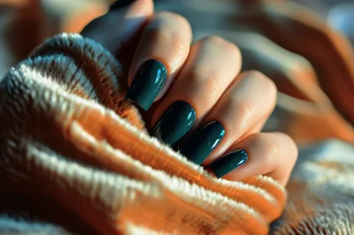 Close Up Of Woman Hands With Dark Green Manicure