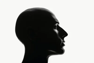 Profile Silhouette Of A Bald Man