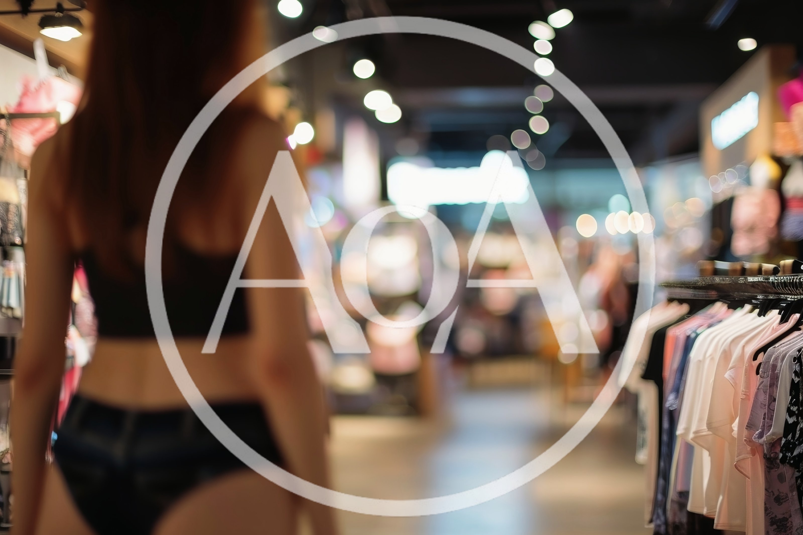Woman Shopping In A Clothing Store