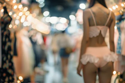 Woman Wearing Lingerie In A Clothing Store