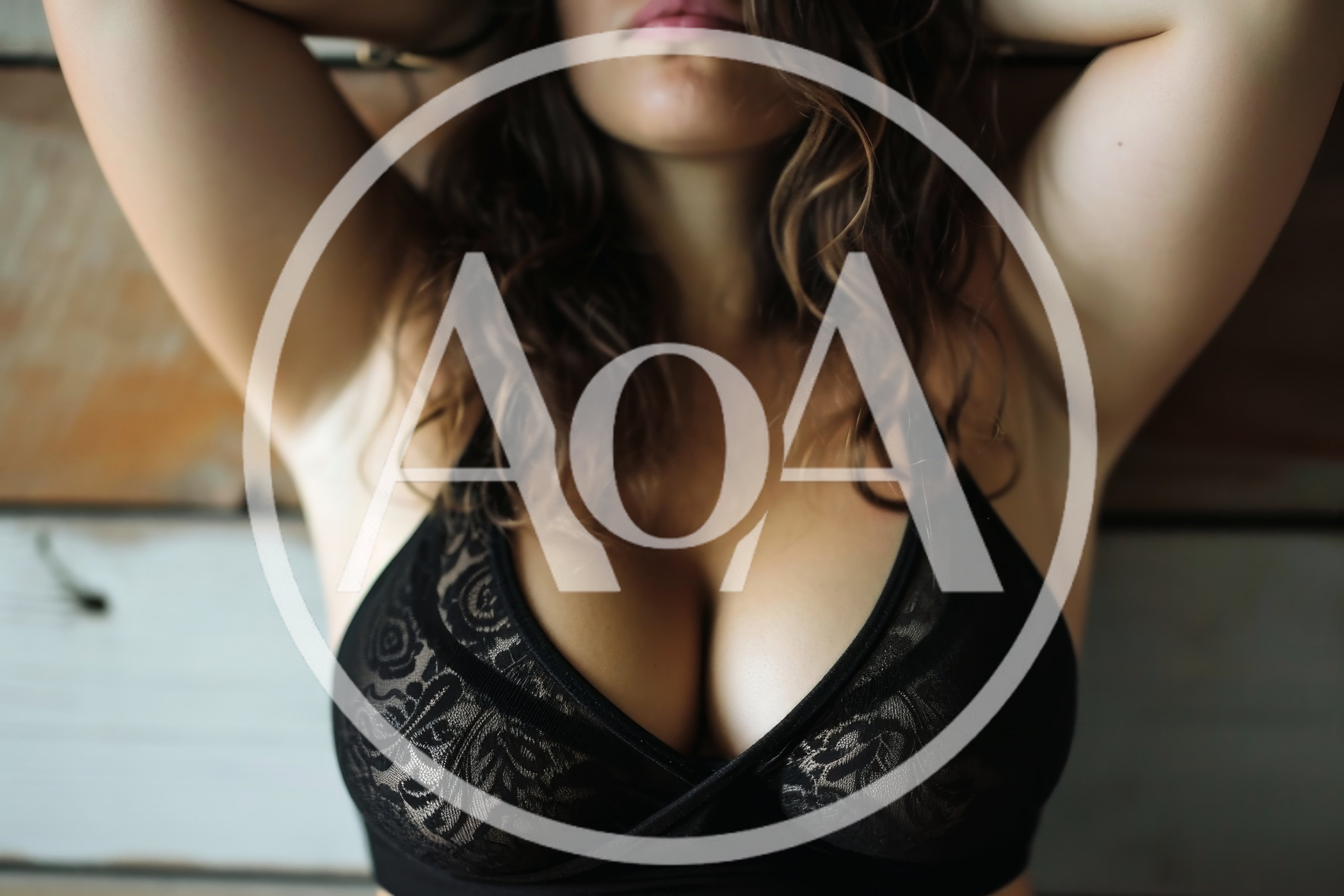 Woman Wearing Black Lace Bra Posing With Arms Raised