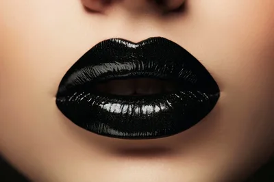 Close Up Of Woman With Glossy Black Lipstick
