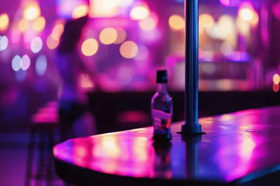 Bottle On A Bar Counter In A Nightclub