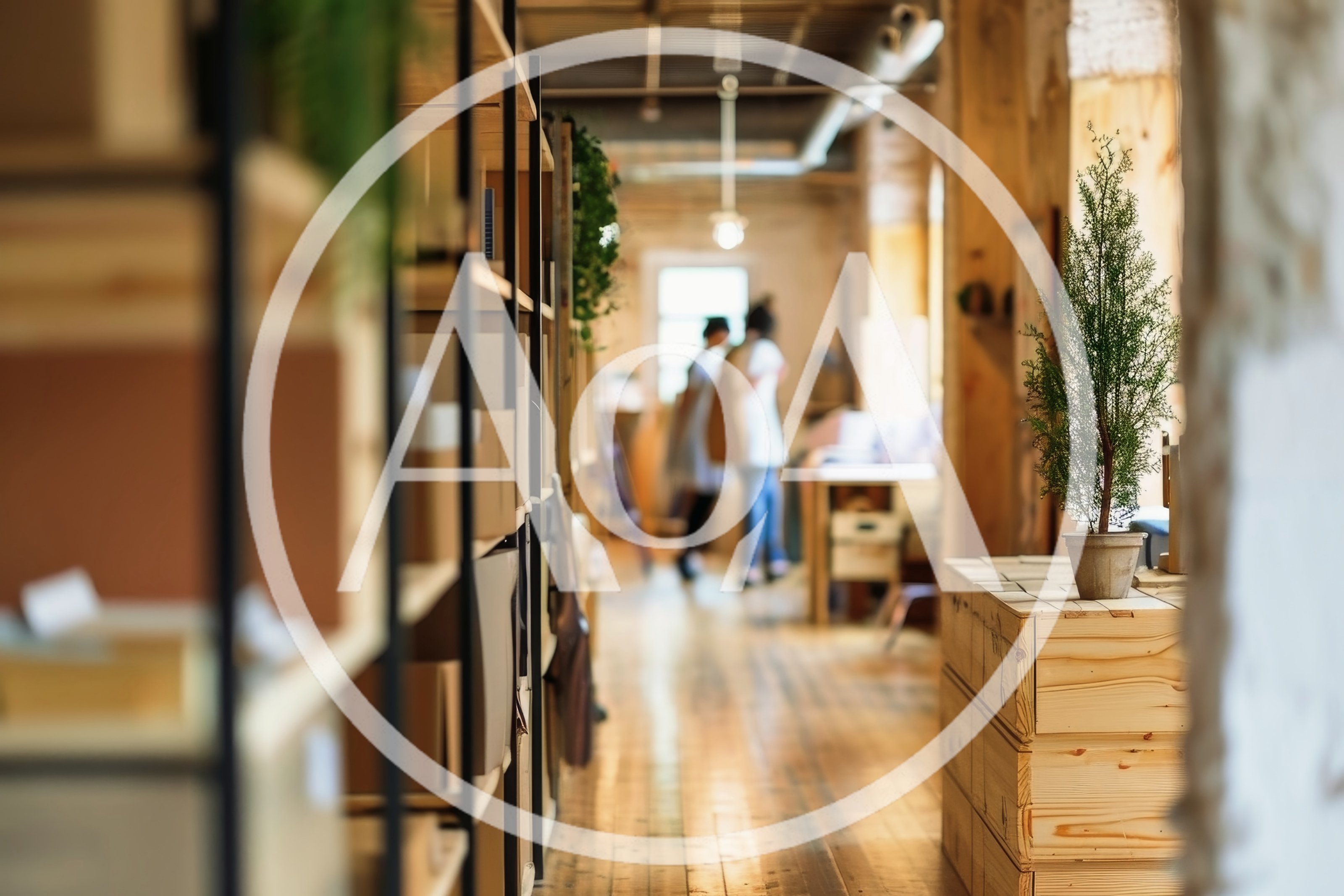 Blurred People Walking Through A Rustic Industrial Office