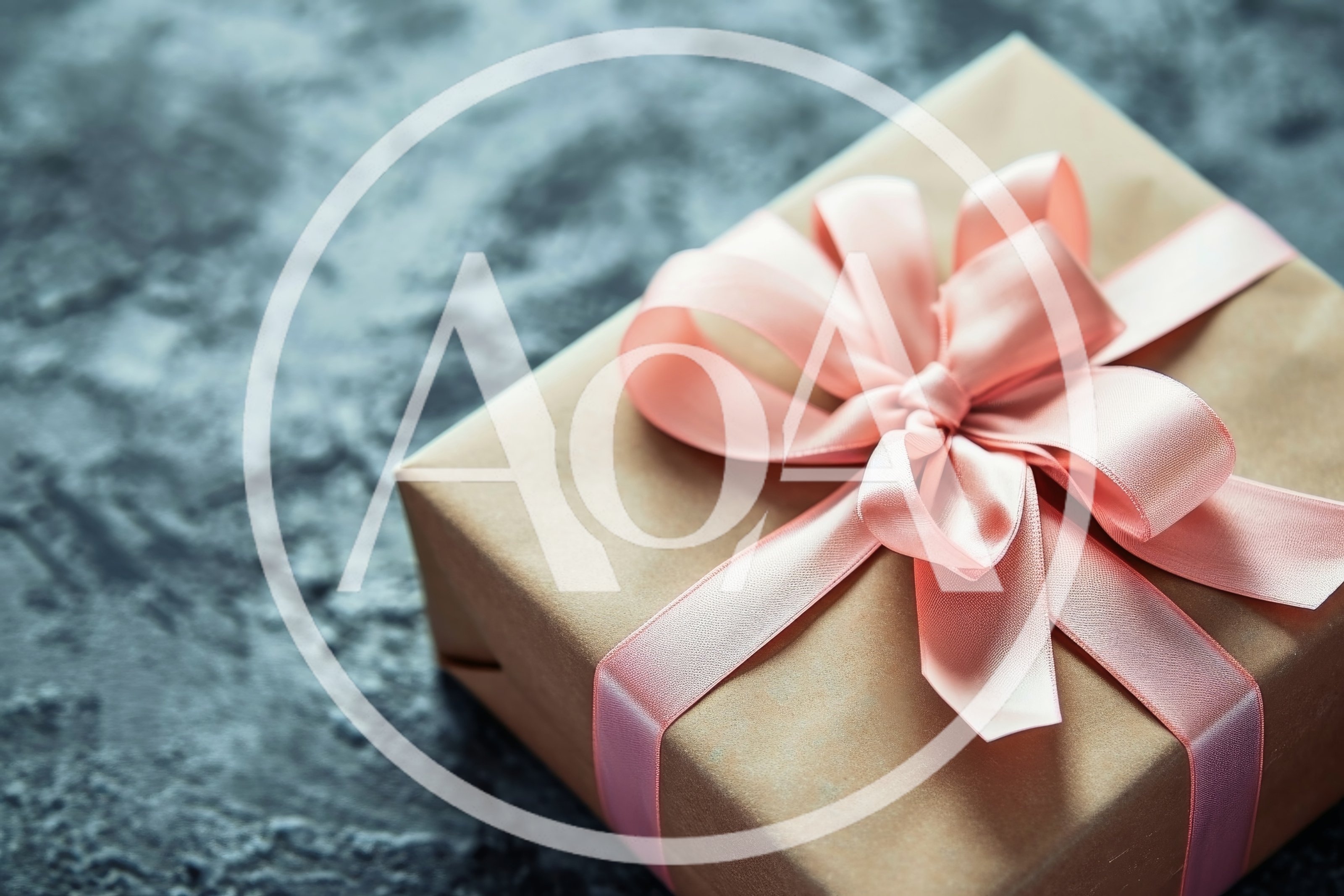 Gift Box Wrapped in Brown Paper with Pink Ribbon
