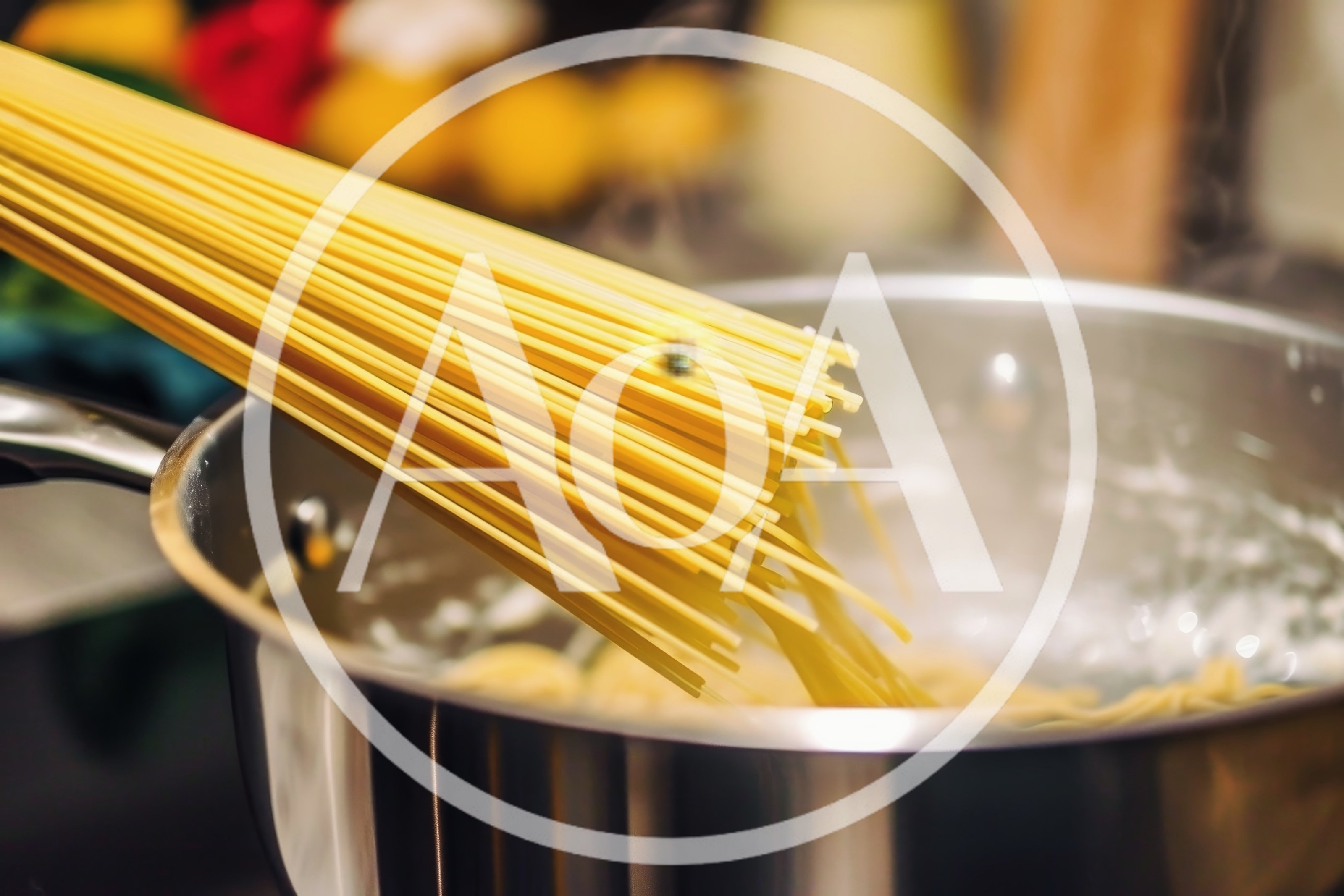 Spaghetti Pasta Being Added To Boiling Water