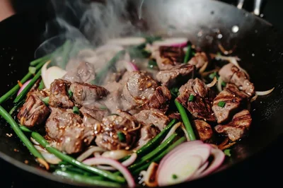 Stir Frying Beef Cubes With Vegetables In A Wok