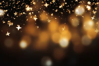 Golden Star Confetti Falling on Dark Background