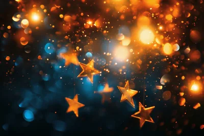 Hanging Golden Star Ornaments Against Bokeh Background