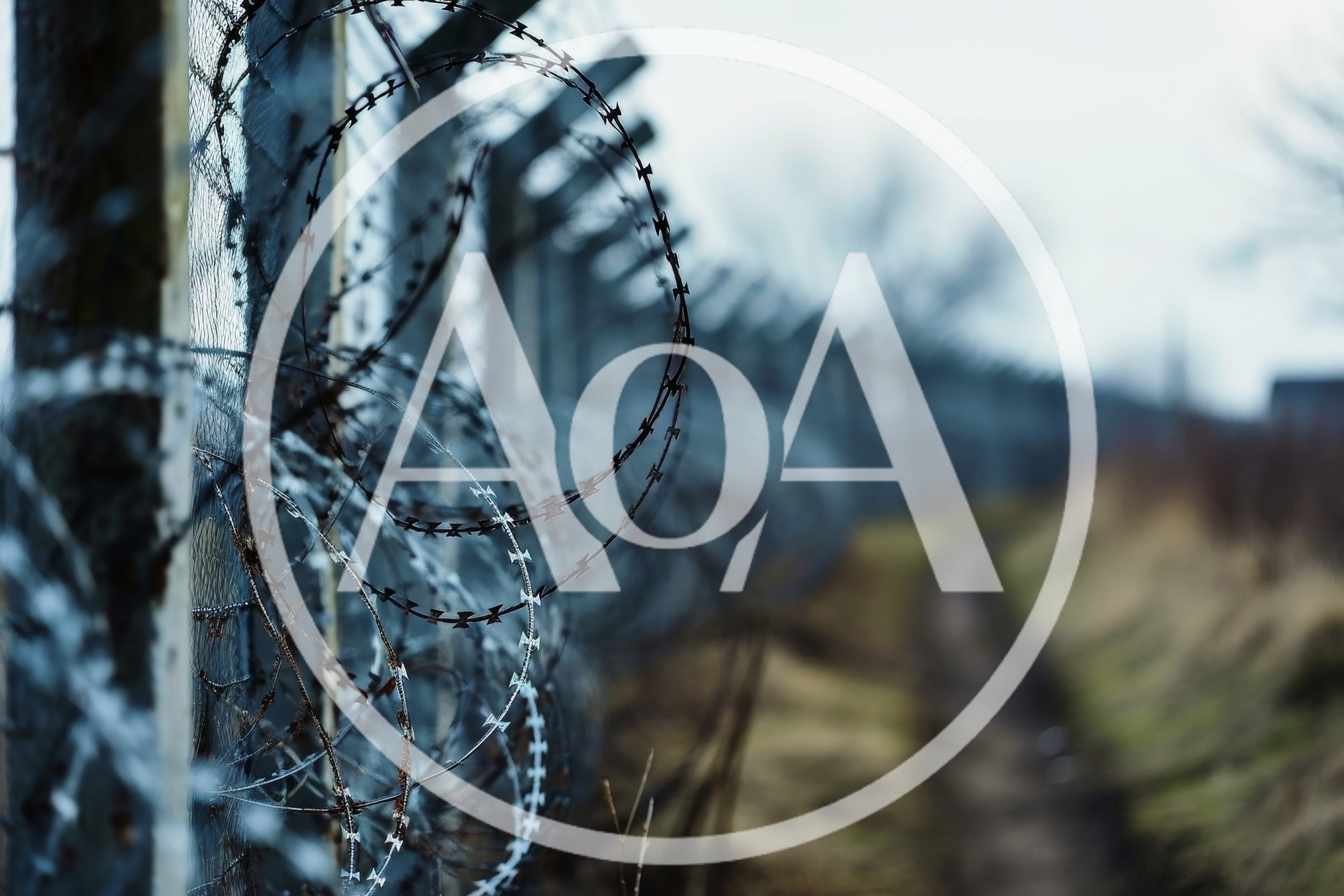 Barbed Wire Fence Along A Remote Dirt Path