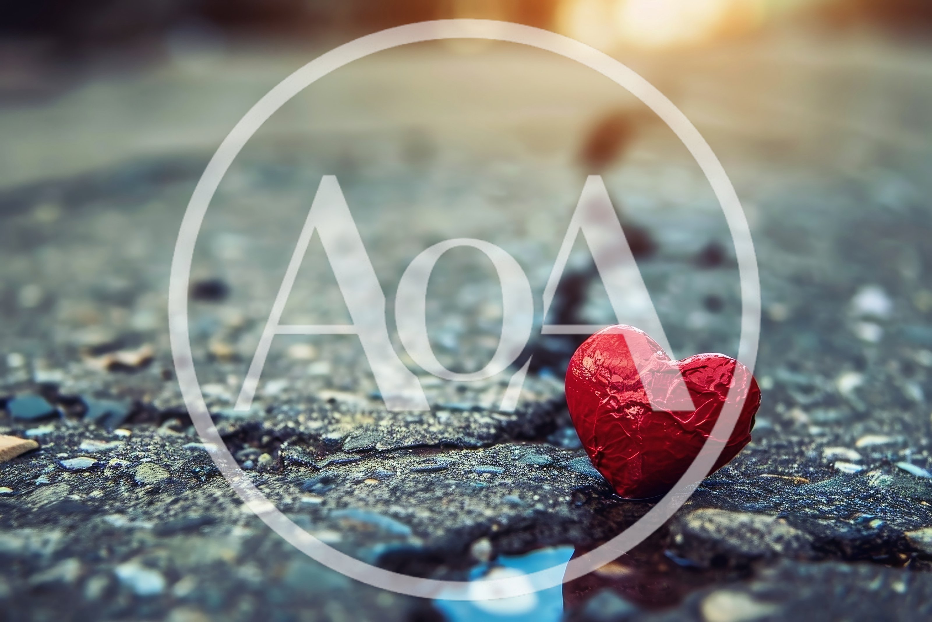 Red Heart Shaped Candy On Cracked Asphalt
