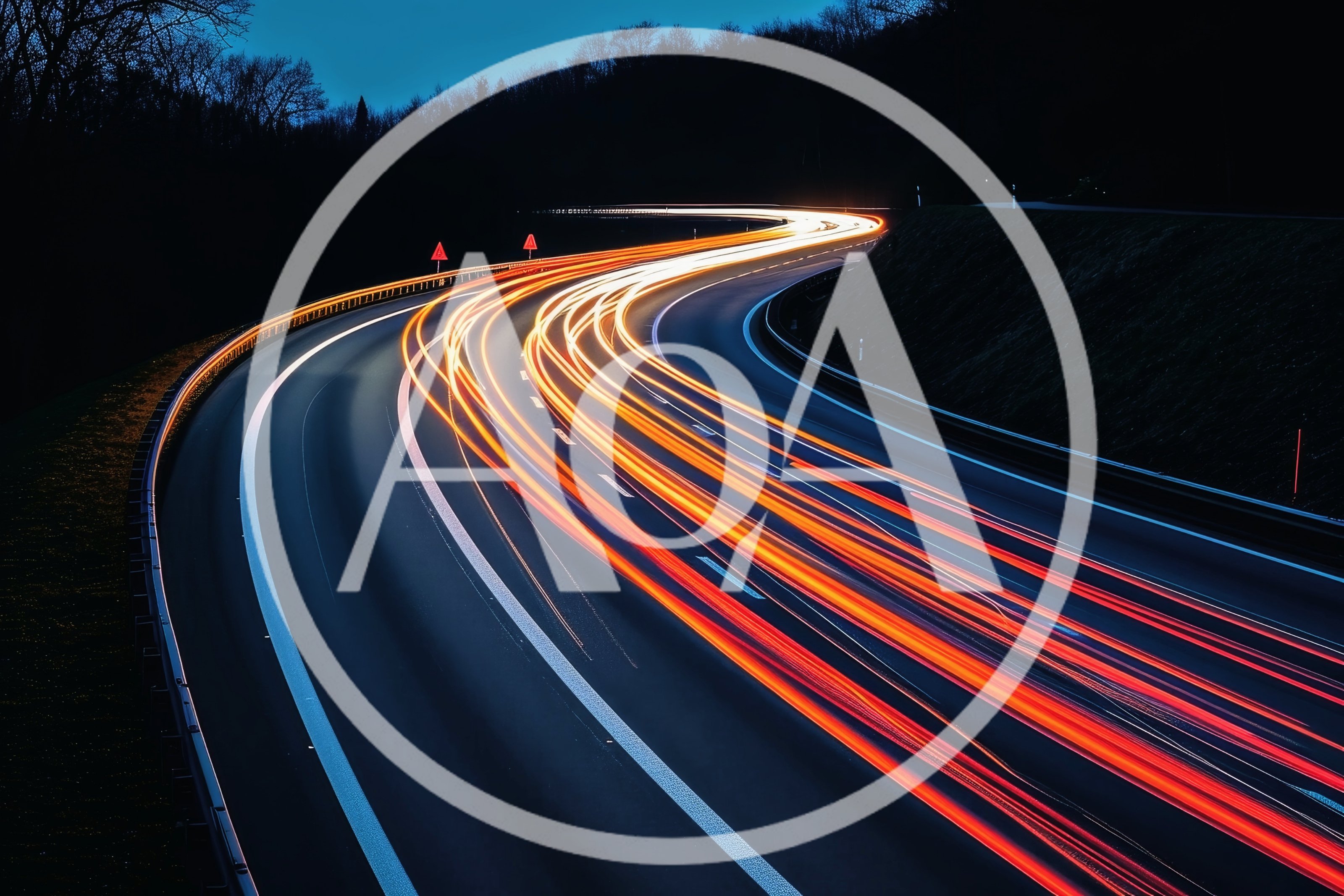 Long Exposure Light Trails On A Winding Highway