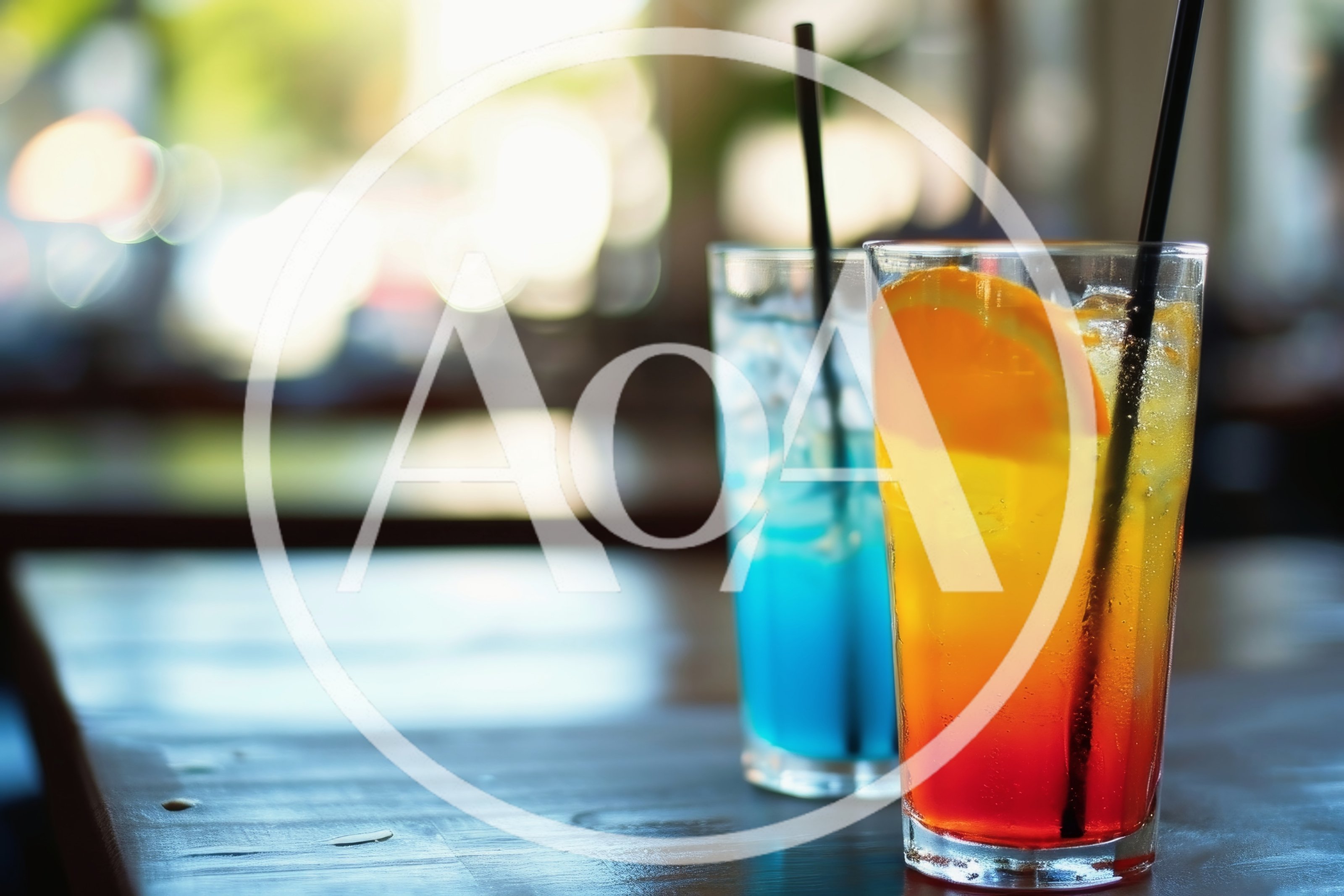Two Refreshing Cocktails On A Wooden Table