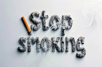 Stop Smoking Text Formed From Cigarette Ash