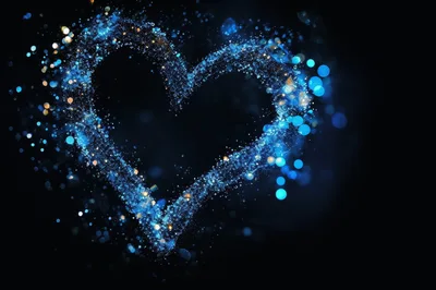 Glowing Blue Particle Heart Shape On Black Background