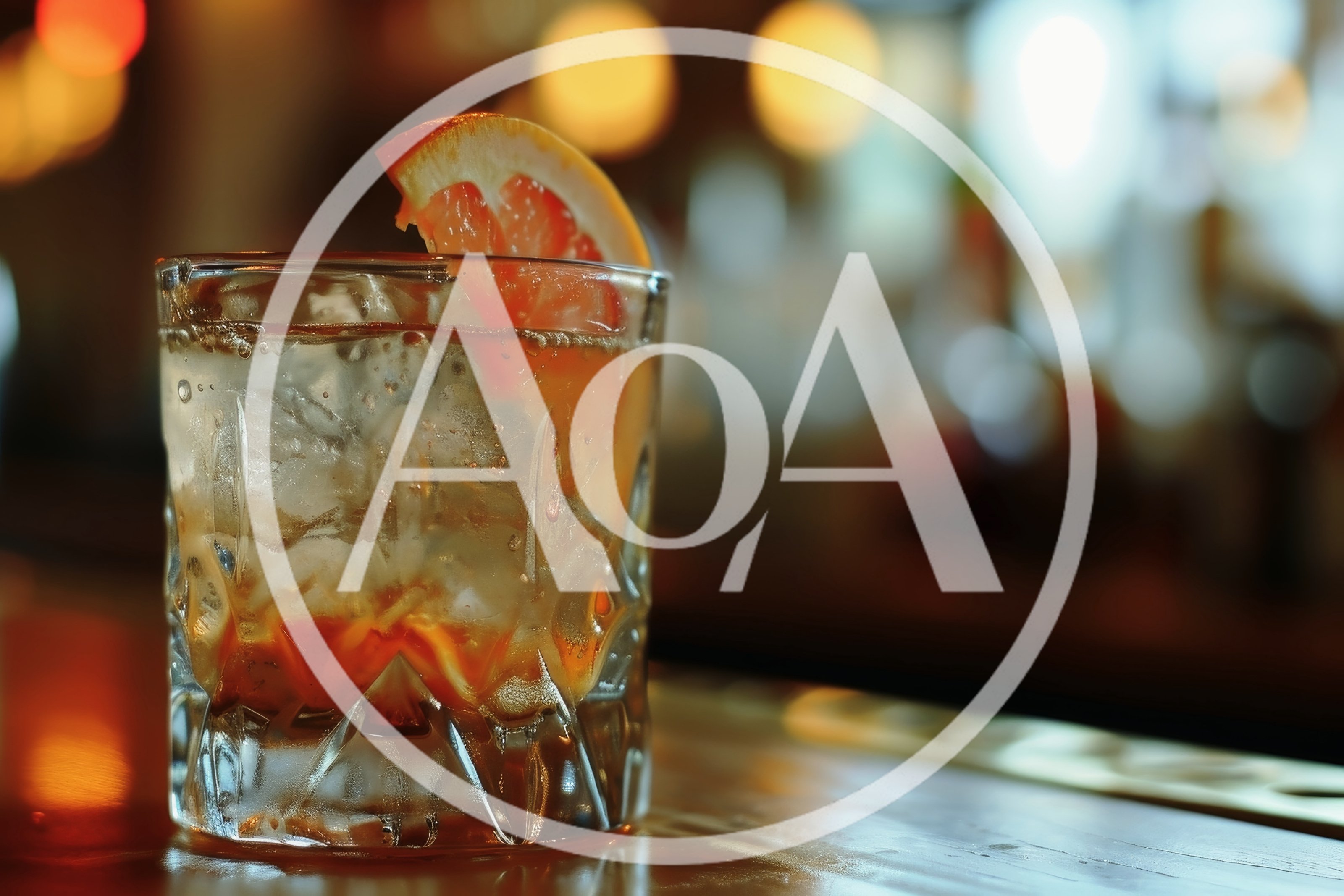 Glass Of Whiskey Cocktail With Grapefruit Garnish