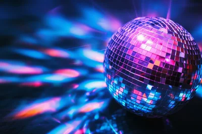 Reflective Disco Ball With Vibrant Blue And Pink Lighting