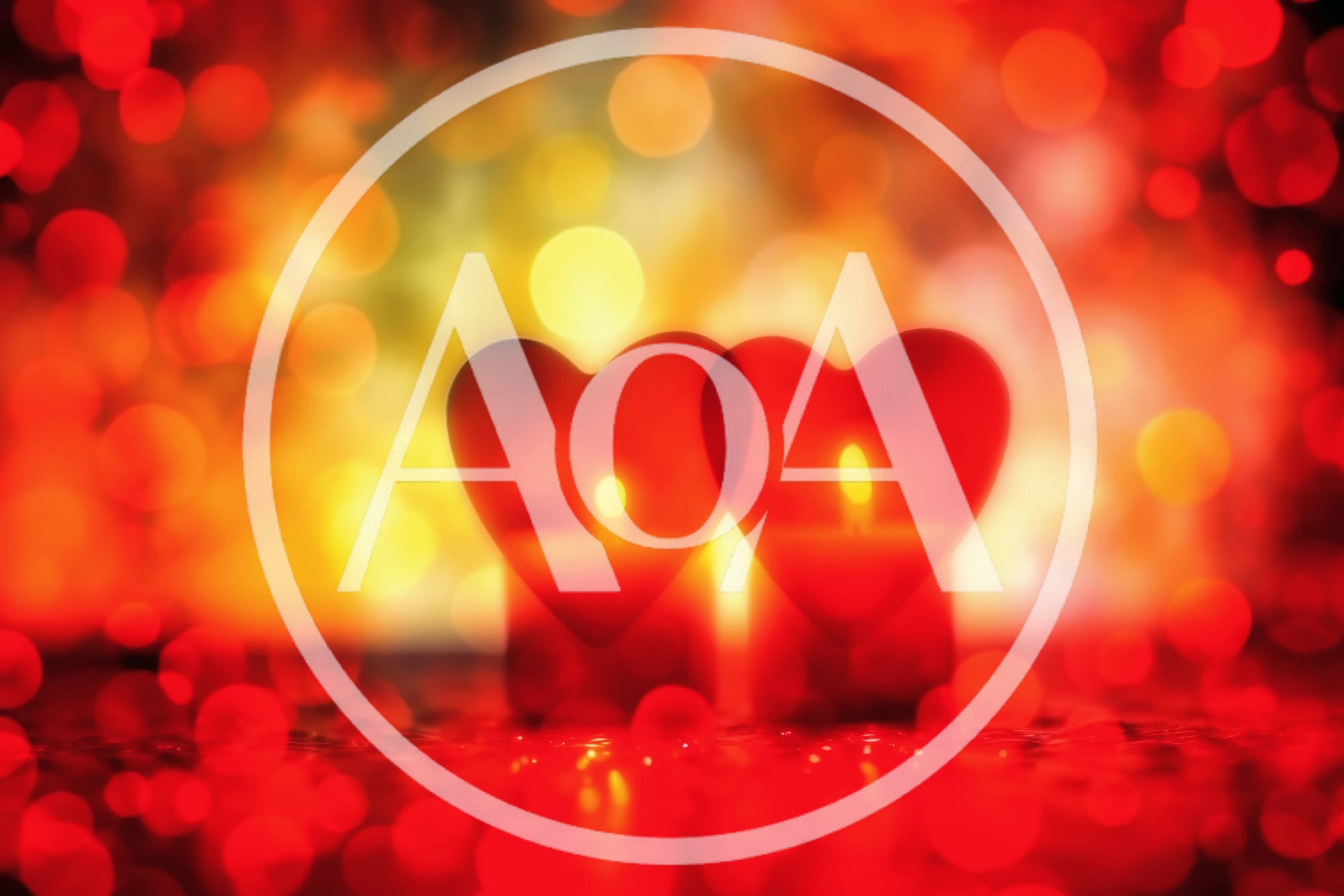 Two Heart Shaped Candles Glowing With Bokeh Background