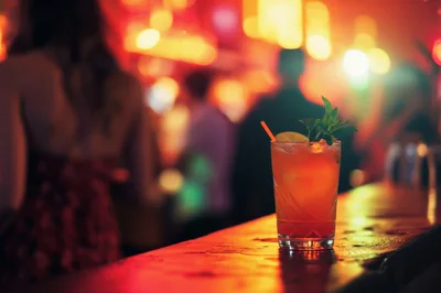 Refreshing Cocktail Drink On A Bar Counter At Night