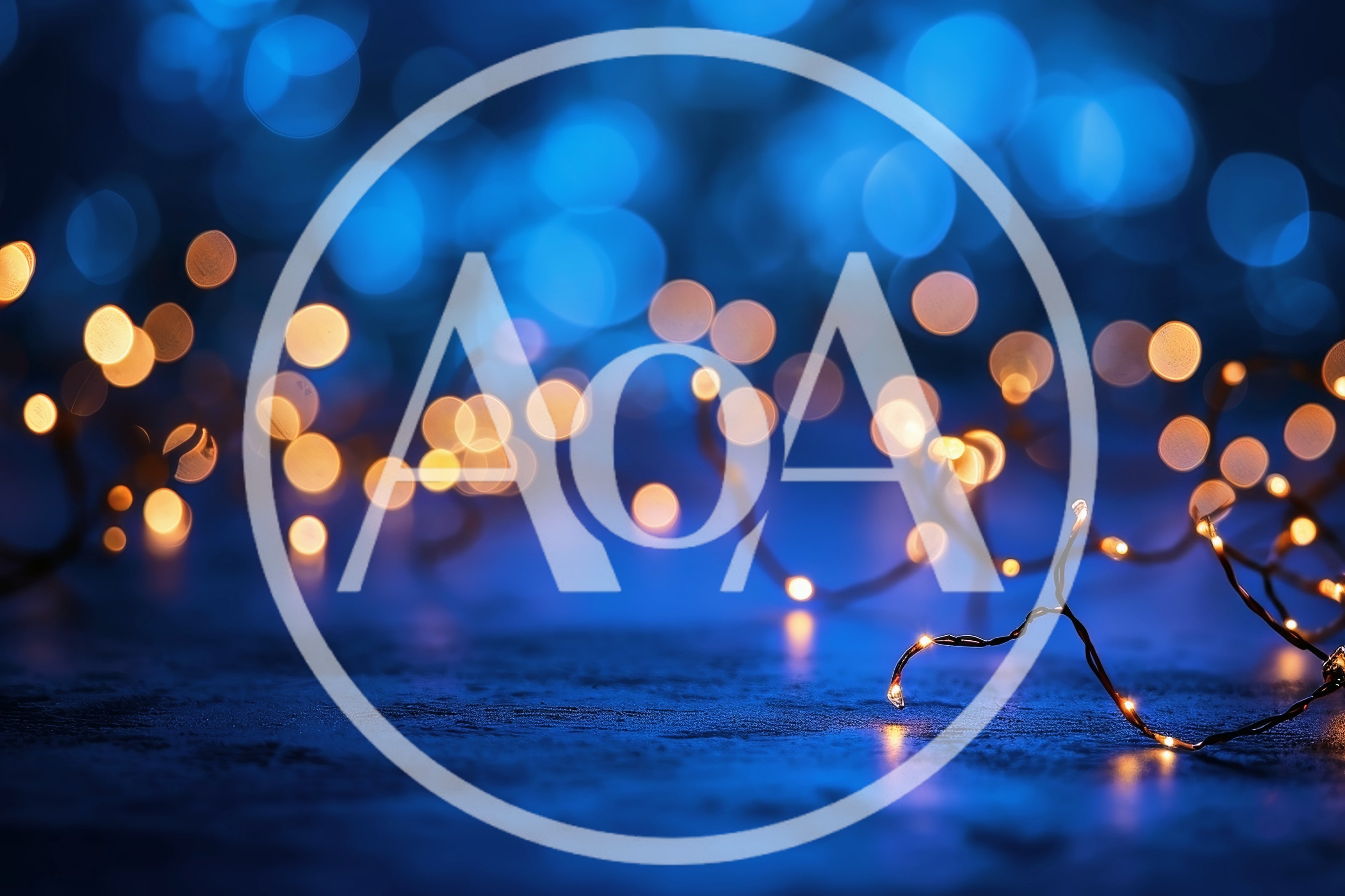 Golden Fairy Lights Against A Deep Blue Bokeh Background