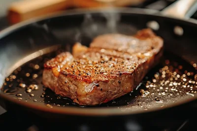 Searing A Thick Ribeye Steak In A Hot Pan