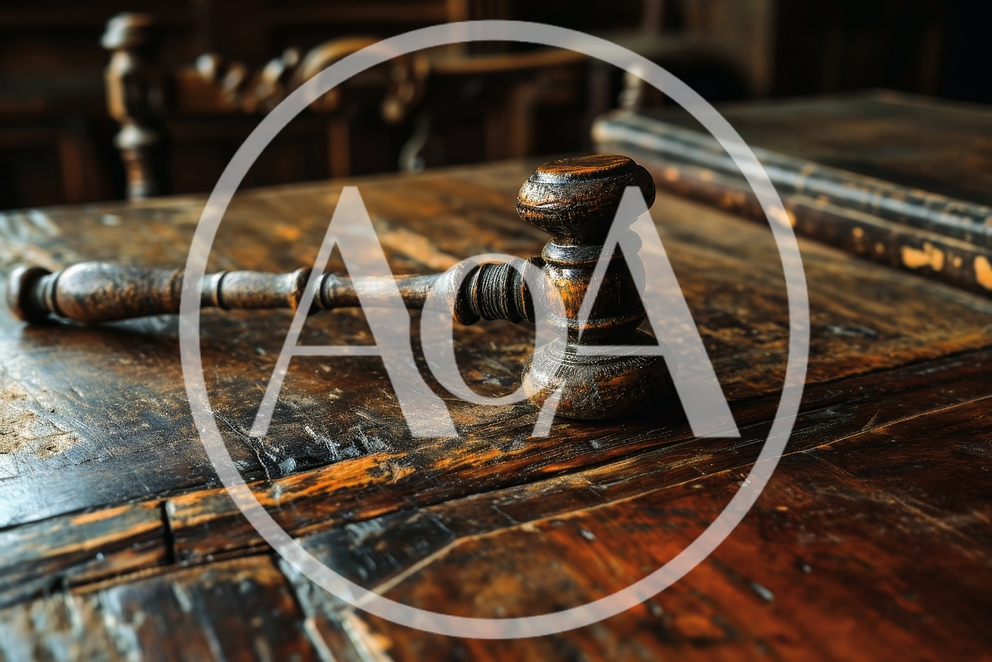 Wooden Judge Gavel Resting On An Antique Desk