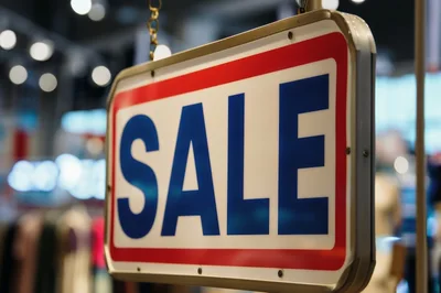 Hanging Sale Sign In A Retail Store