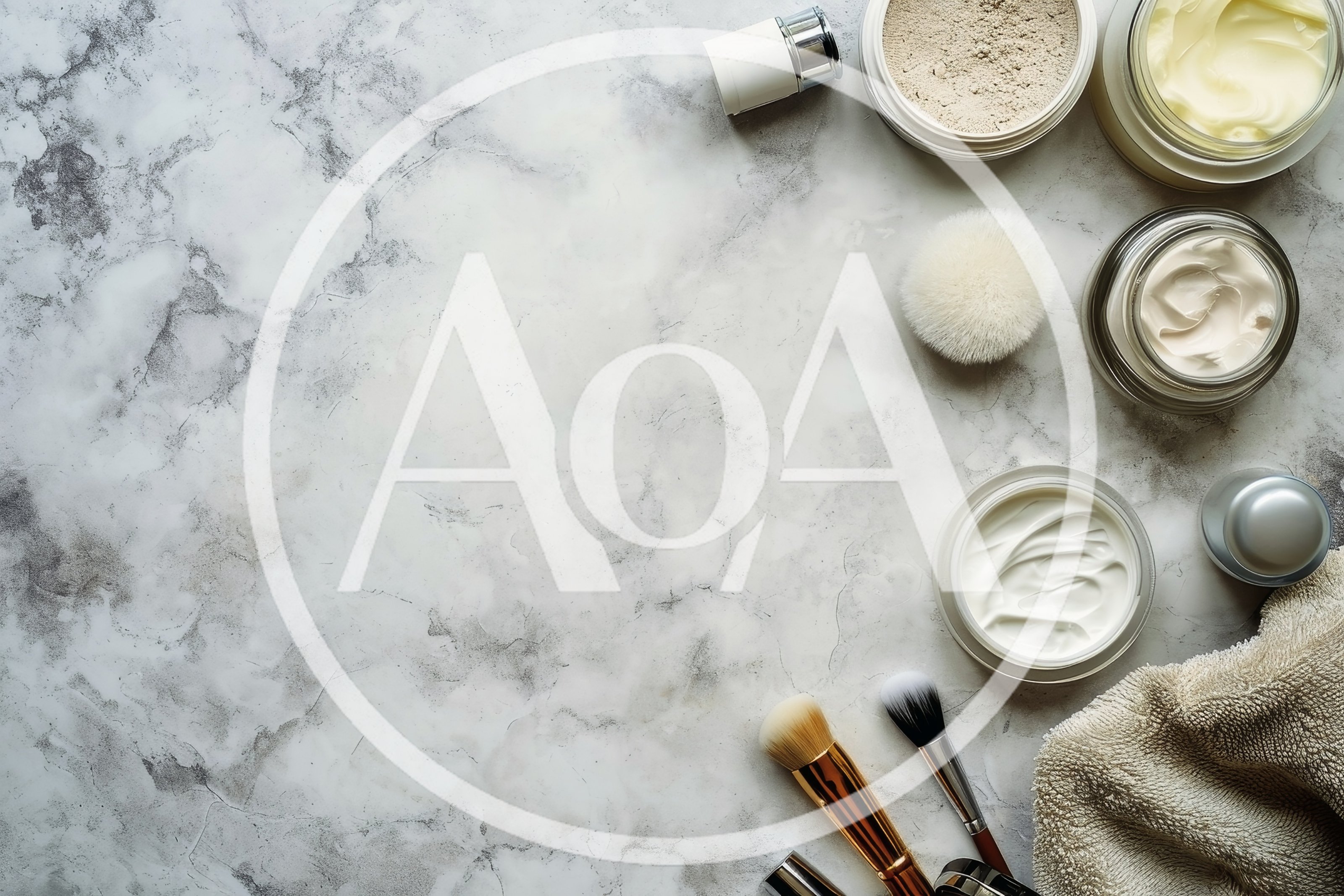 Skincare Products and Makeup Brushes on Marble Surface