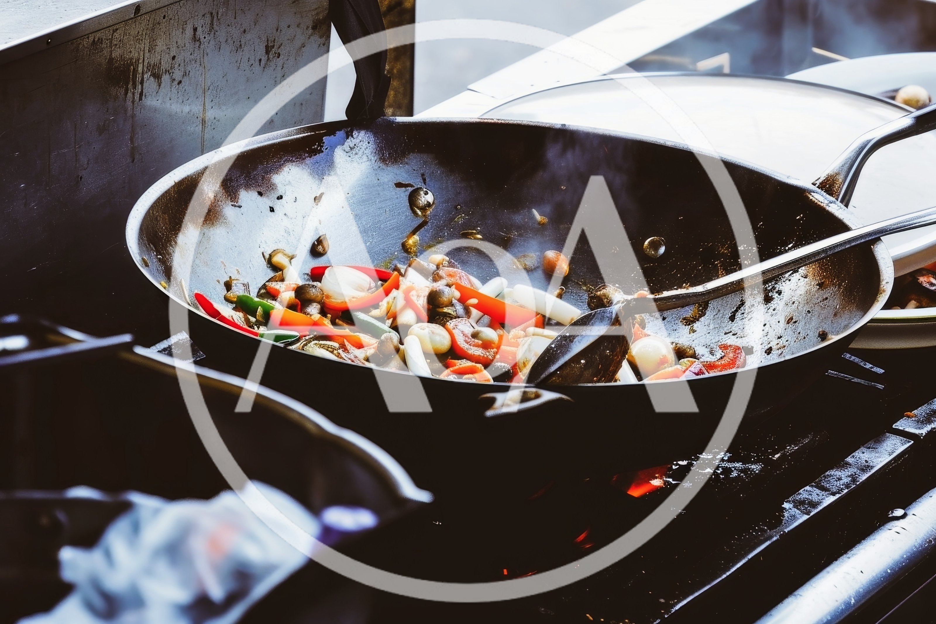 Stir Frying Fresh Vegetables In A Large Wok