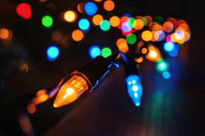 Close Up Of Glowing Christmas String Lights