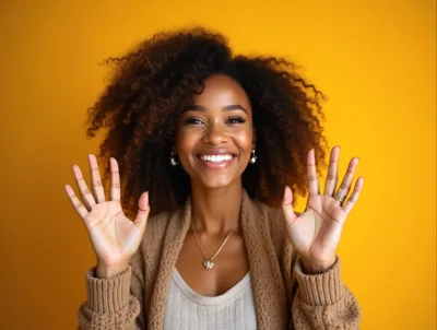 Smiling Woman With Curly Hair Showing Open Palms