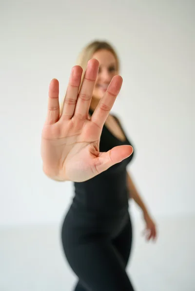 Woman Making A Stop Gesture With Her Hand