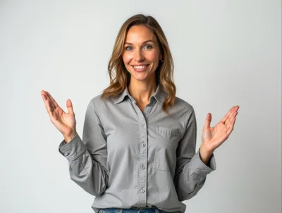 Smiling Woman Gesturing With Open Hands Against White Background