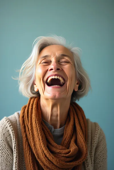 Joyful Senior Woman Laughing With Eyes Closed