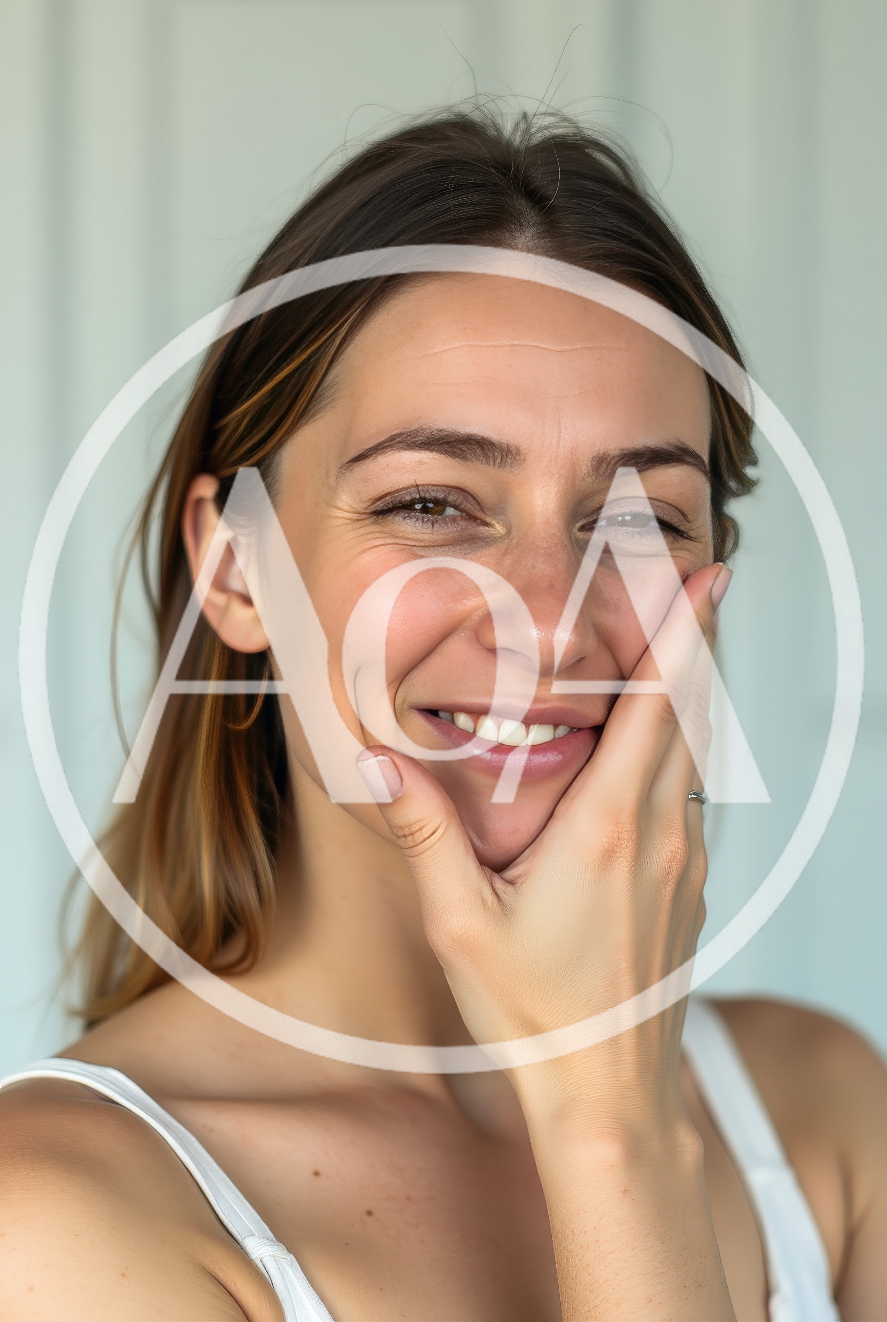 Smiling Woman Touching Her Face With Hand