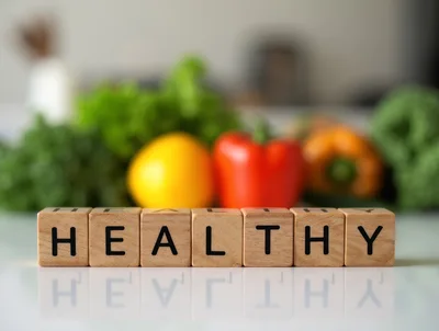 Wooden Blocks Spelling Healthy With Fresh Vegetables