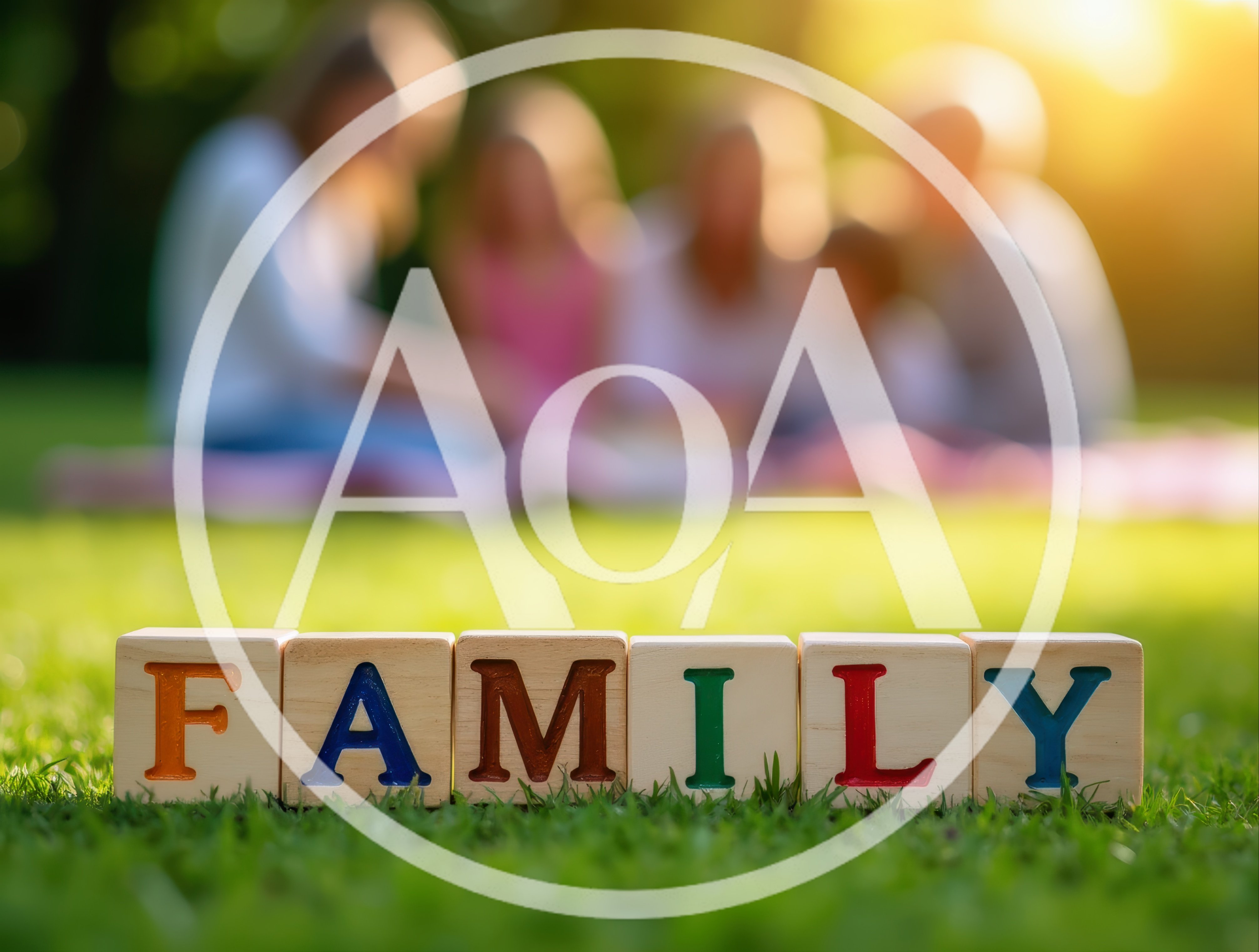 Wooden Blocks Spelling Family on Green Grass
