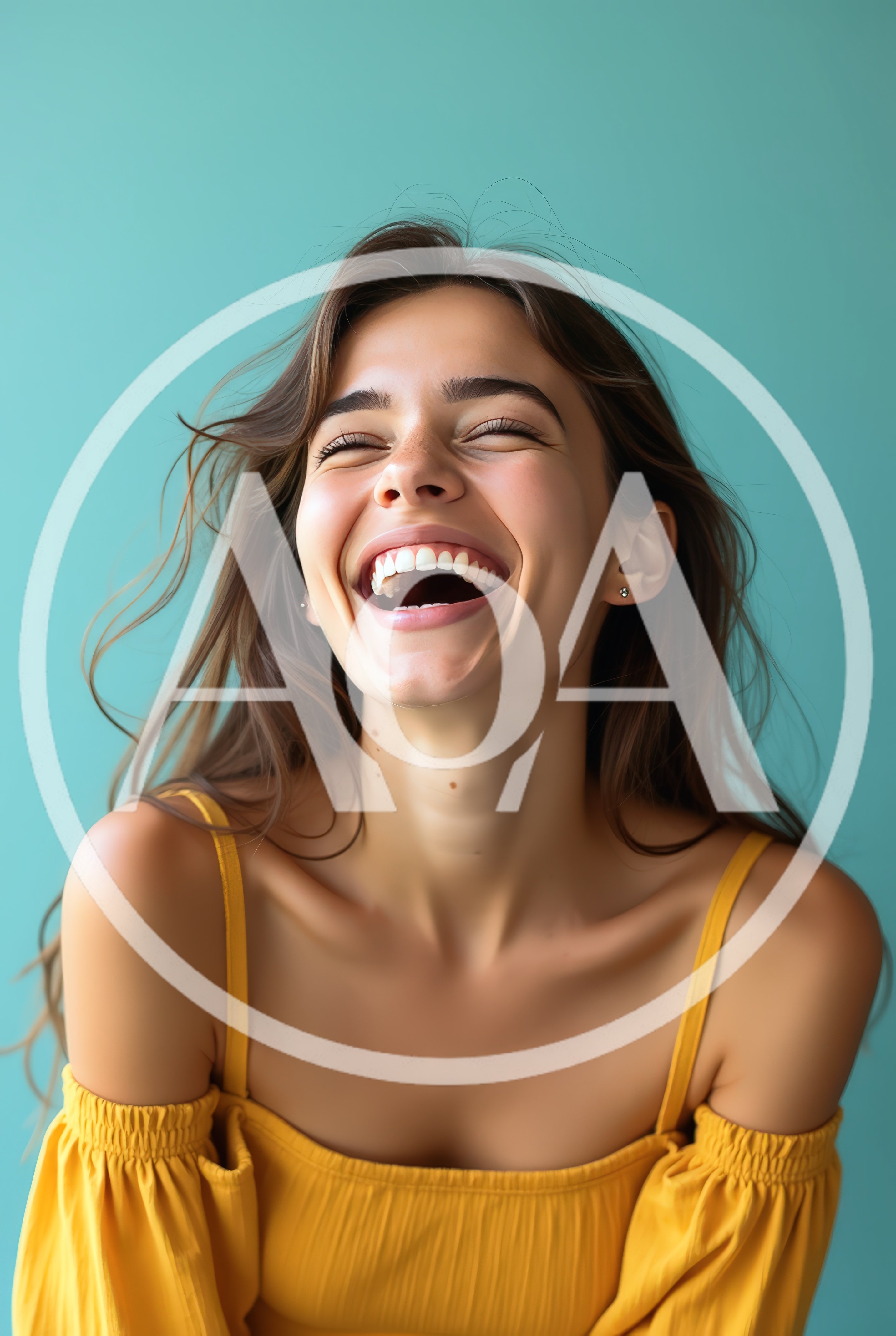 Young Woman Laughing Joyfully Against Teal Background