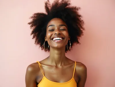 Happy Young Woman With Afro Hair Smiling